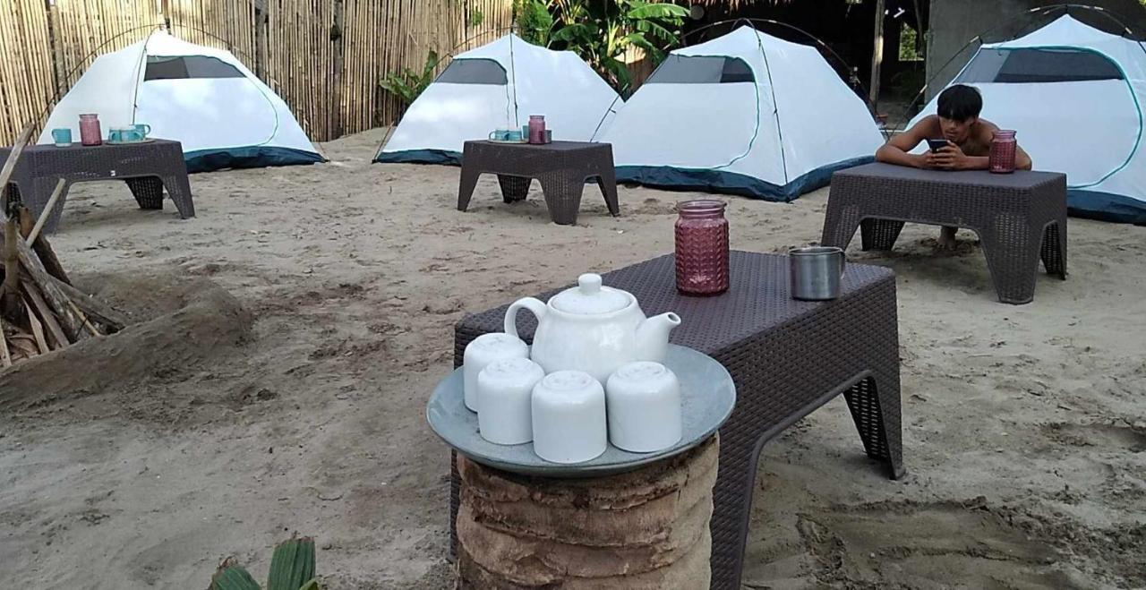 Bucana Kamp Payapa Beachfront Эль-Нидо Экстерьер фото