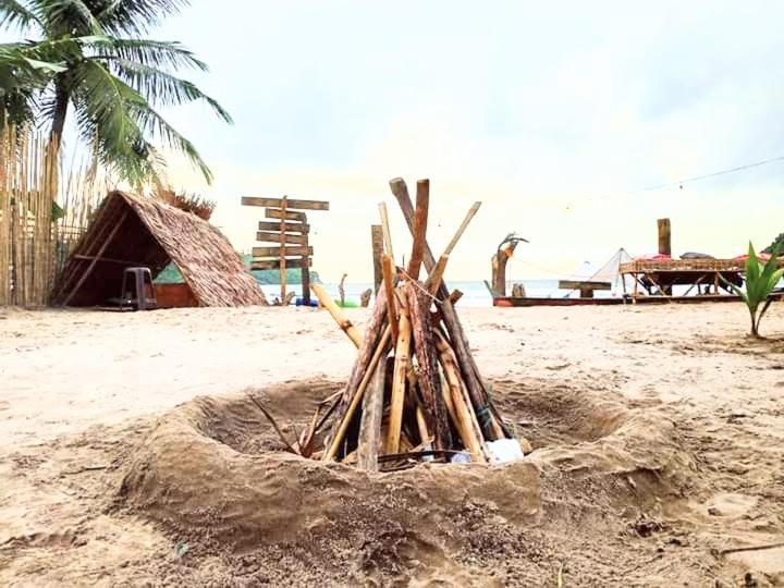Bucana Kamp Payapa Beachfront Эль-Нидо Экстерьер фото