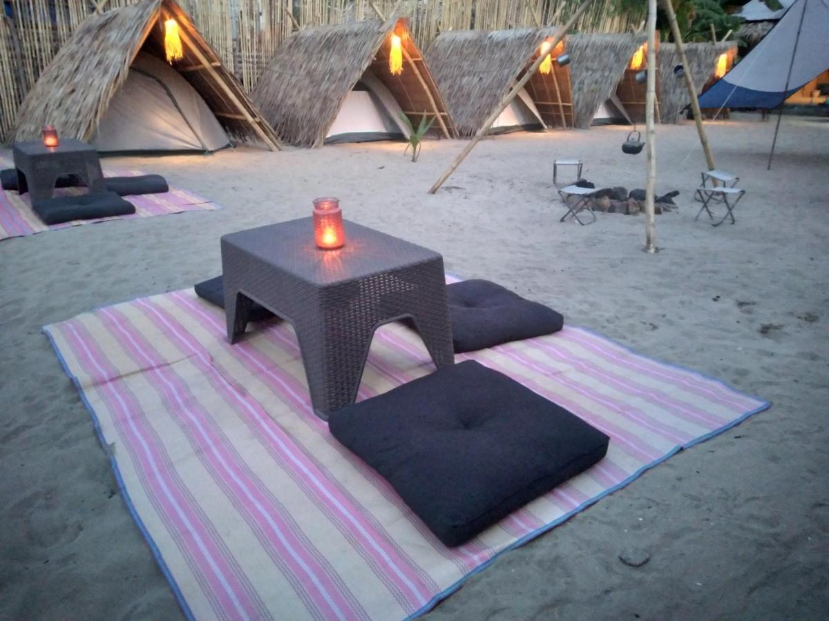 Bucana Kamp Payapa Beachfront Эль-Нидо Экстерьер фото