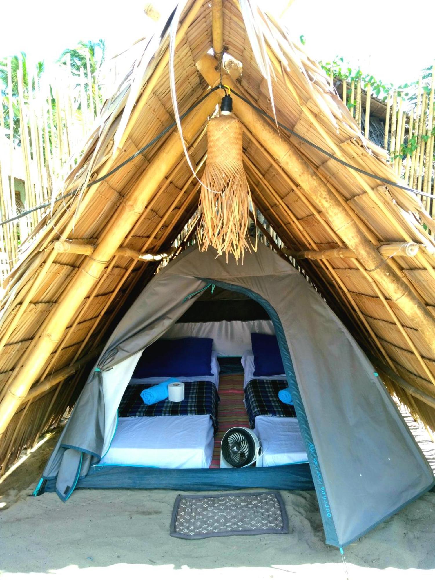 Bucana Kamp Payapa Beachfront Эль-Нидо Экстерьер фото